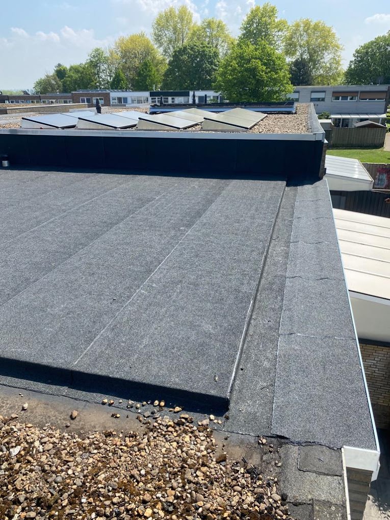 Plat dak reparatie
